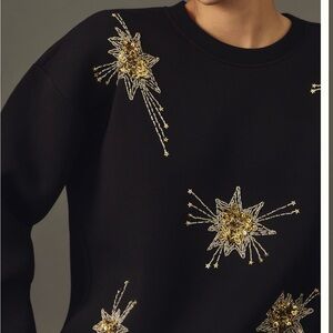 Anthropologie Black Sweatshirt with Gold Star Embellishments